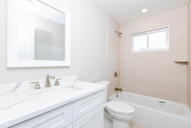 full bathroom featuring toilet, shower / washtub combination, and vanity