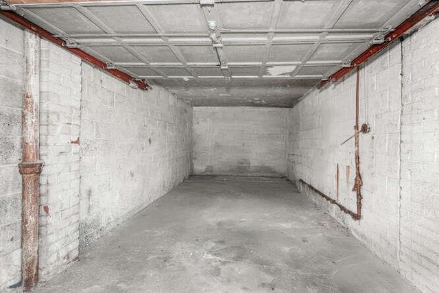 3317 Gunther Ave, Bronx, NY 10469 - below grade area featuring concrete block wall and a garage