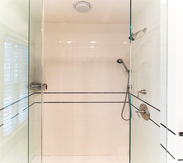 bathroom featuring a shower stall