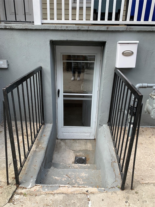 2263 Ryer Ave, Bronx, NY 10457 - entrance to property with stucco siding