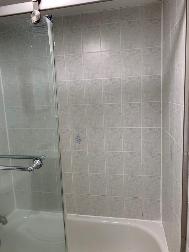 2263 Ryer Ave, Bronx, NY 10457 - bathroom featuring a tub and an enclosed shower
