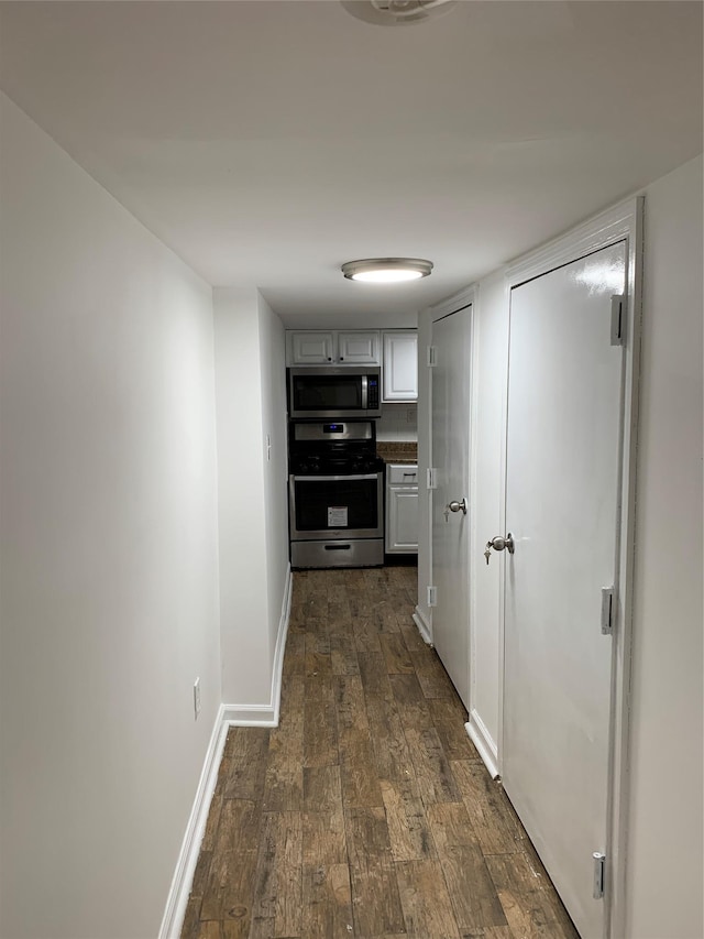 2263 Ryer Ave, Bronx, NY 10457 - hall featuring baseboards and dark wood-style flooring