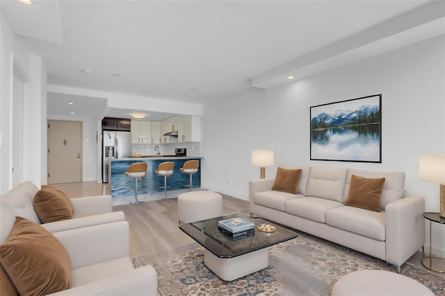 45-16 83rd Rd Unit E6J, Elmhurst, NY 11373 - living room with recessed lighting and light wood-style flooring