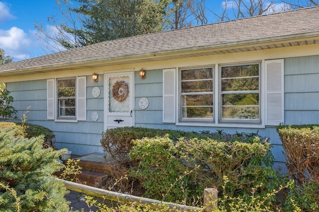 495 Knollwood Ln, Mattituck, NY 11952 - doorway to property featuring a shingled roof