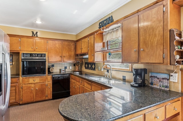 495 Knollwood Ln, Mattituck, NY 11952 - kitchen featuring brown cabinetry, tasteful backsplash, black appliances, under cabinet range hood, and a sink