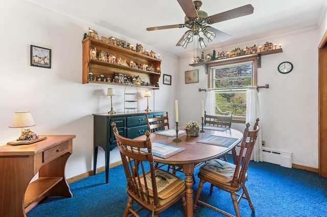 495 Knollwood Ln, Mattituck, NY 11952 - carpeted dining room with baseboards, a baseboard heating unit, ornamental molding, and a ceiling fan
