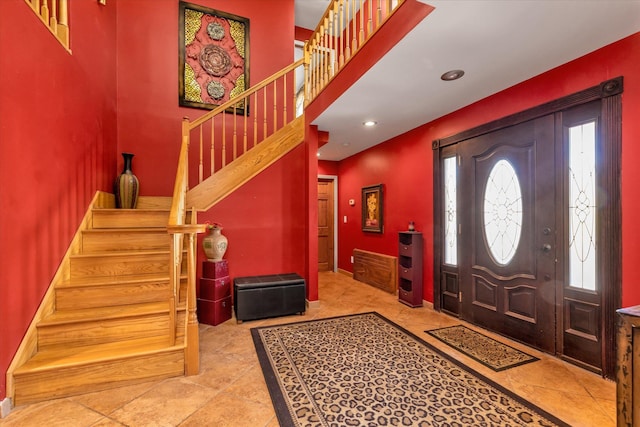 580 Foxhurst Rd, Baldwin, NY 11510 - entryway with stairway and recessed lighting