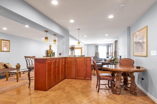 580 Foxhurst Rd, Baldwin, NY 11510 - dining space with recessed lighting and baseboards