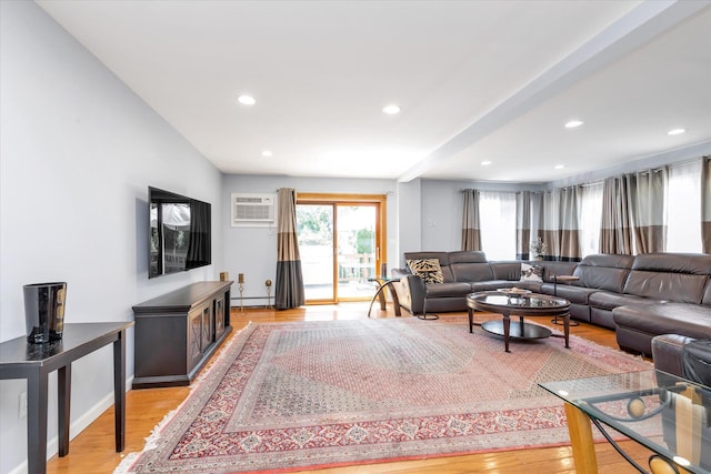 580 Foxhurst Rd, Baldwin, NY 11510 - living room featuring a wall mounted AC, light wood-style floors, a baseboard radiator, and recessed lighting