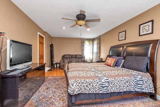 580 Foxhurst Rd, Baldwin, NY 11510 - bedroom with wood finished floors, baseboards, recessed lighting, and ceiling fan