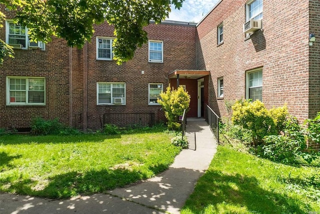 78-05 Park Dr E Unit 4B, Kew Garden Hills, NY 11367 - view of front of house with a front lawn and brick siding