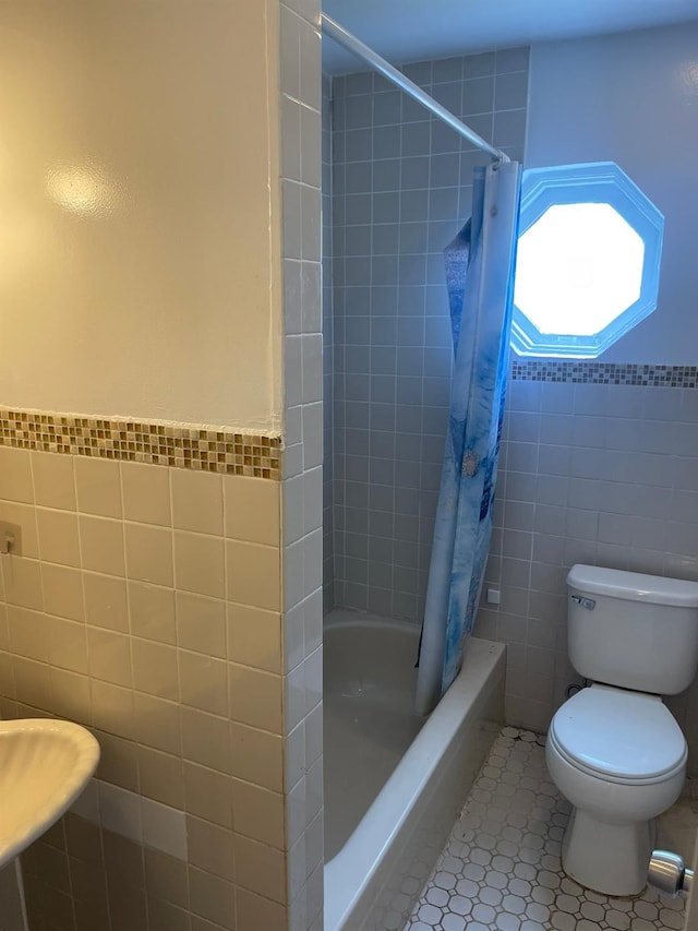 78-05 Park Dr E Unit 4B, Kew Garden Hills, NY 11367 - full bathroom with tile walls, tile patterned floors, and shower / tub combo