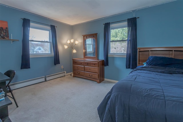 bedroom with baseboards, carpet, multiple windows, and baseboard heating
