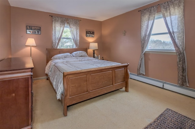 bedroom featuring a baseboard radiator, baseboards, multiple windows, and light colored carpet