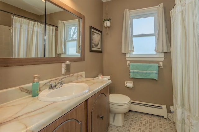 full bath featuring toilet, vanity, and baseboard heating