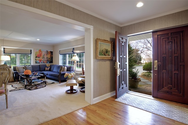 65 Elm Dr, East Hills, NY 11576 - entrance foyer featuring plenty of natural light, wood finished floors, baseboards, ornamental molding, and recessed lighting