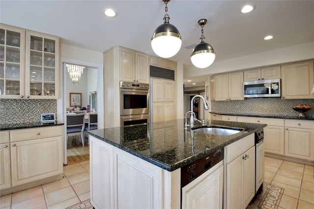 65 Elm Dr, East Hills, NY 11576 - kitchen featuring stainless steel appliances, a sink, light tile patterned flooring, tasteful backsplash, and recessed lighting