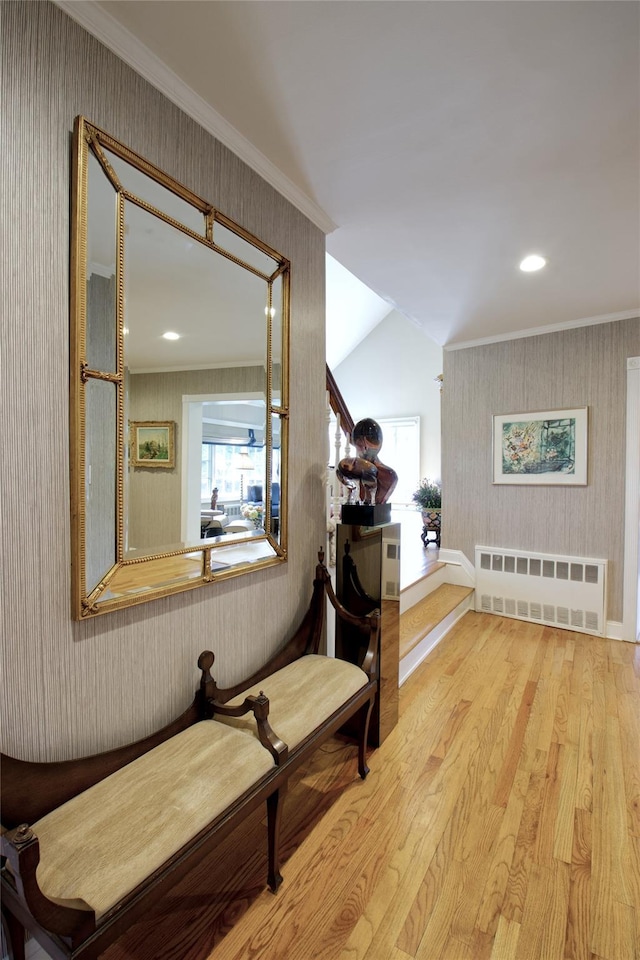 65 Elm Dr, East Hills, NY 11576 - hall featuring wallpapered walls, radiator, wood finished floors, and ornamental molding