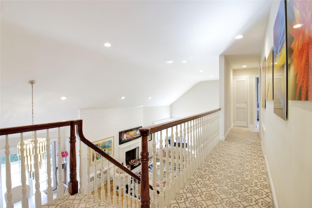 65 Elm Dr, East Hills, NY 11576 - hall with recessed lighting, a chandelier, vaulted ceiling, baseboards, and an upstairs landing