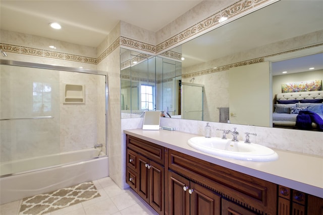 65 Elm Dr, East Hills, NY 11576 - bathroom featuring vanity, combined bath / shower with glass door, and tile patterned flooring