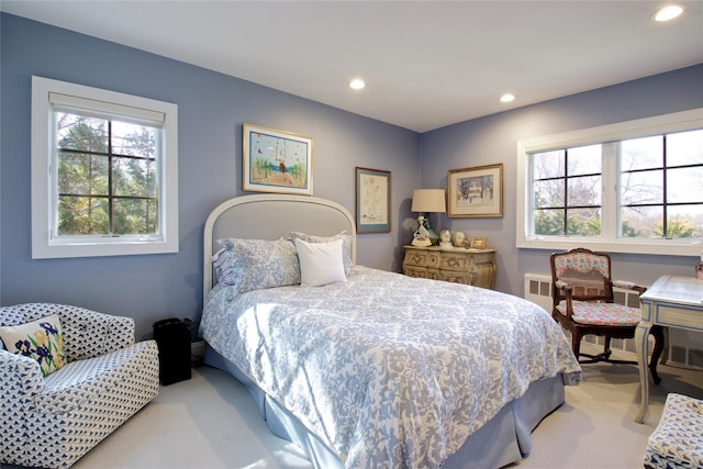 65 Elm Dr, East Hills, NY 11576 - bedroom featuring light colored carpet, multiple windows, recessed lighting, and baseboards