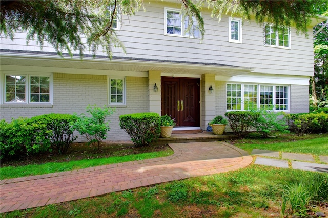 65 Elm Dr, East Hills, NY 11576 - view of front of home featuring brick siding