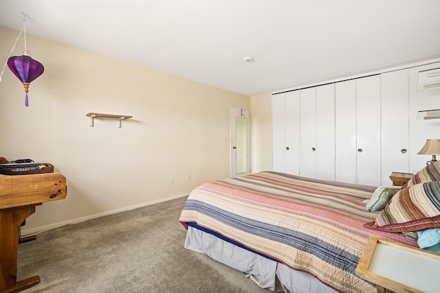 carpeted bedroom with baseboards
