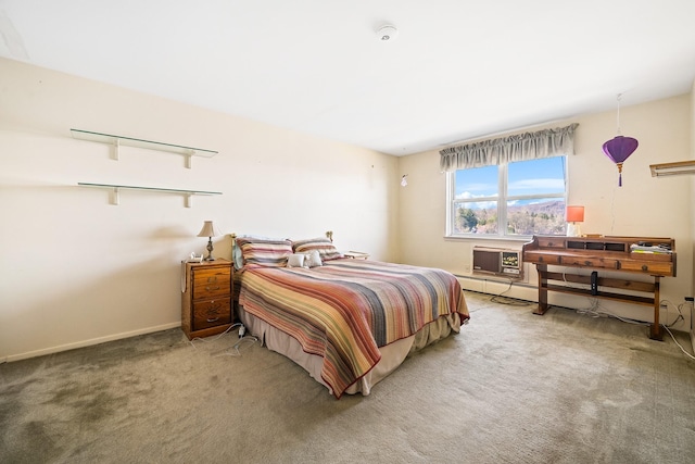 carpeted bedroom featuring baseboards and a baseboard radiator