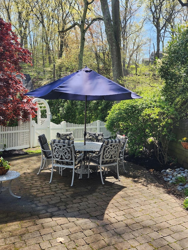 68 Oakdale Rd, Centerport, NY 11721 - view of patio / terrace with outdoor dining space and a fenced backyard