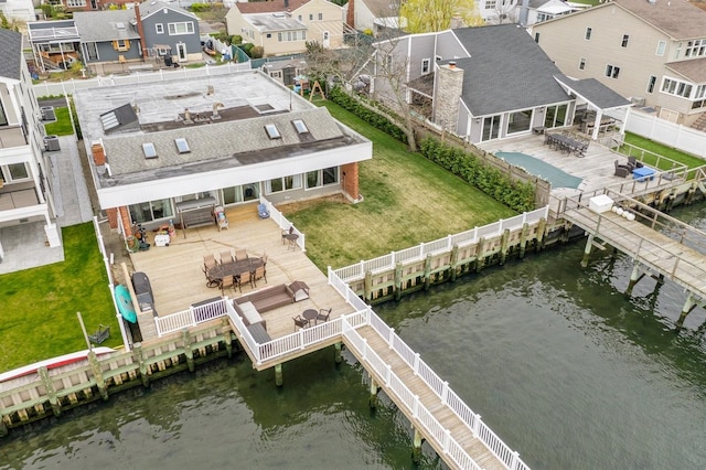 200 Block Ln, Island Park, NY 11558 - aerial perspective of suburban area with a nearby body of water