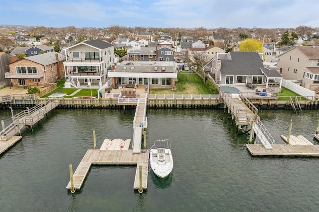 200 Block Ln, Island Park, NY 11558 - dock featuring a residential view, a water view, and a fenced backyard