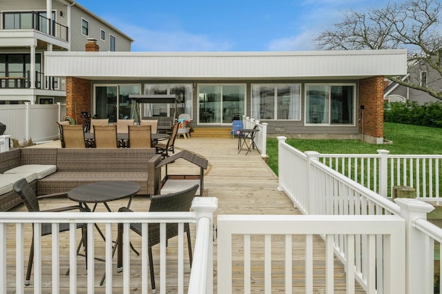 200 Block Ln, Island Park, NY 11558 - wooden deck featuring outdoor dining area