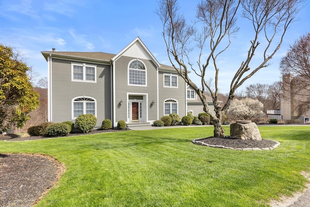 view of front of home with a front yard