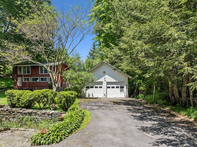 27 Powder Mill Rd, Newburgh, NY 12550 - view of front facade featuring a garage