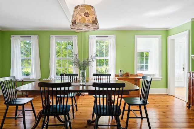 27 Powder Mill Rd, Newburgh, NY 12550 - dining area with ornamental molding, hardwood / wood-style flooring, and baseboards