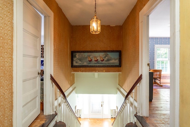 27 Powder Mill Rd, Newburgh, NY 12550 - staircase featuring wallpapered walls and wood finished floors