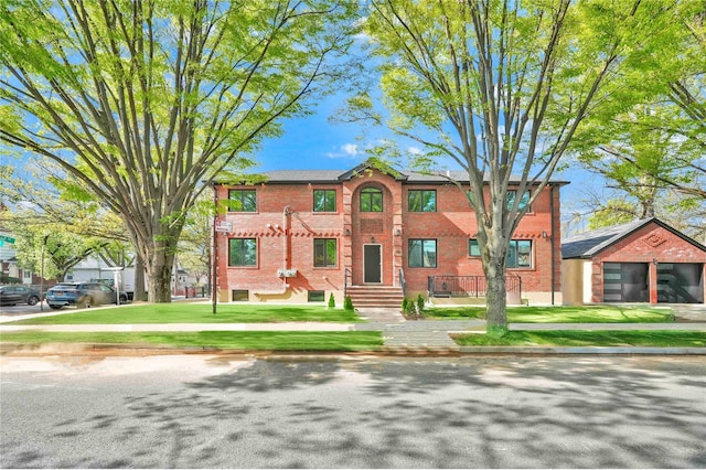 76-17 162nd St, Fresh Meadows, NY 11366 - multi unit property with a front yard and brick siding