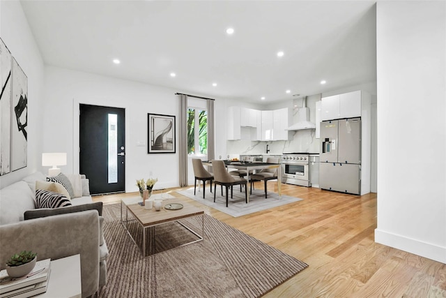 76-17 162nd St, Fresh Meadows, NY 11366 - living area featuring recessed lighting, light wood-style flooring, and baseboards