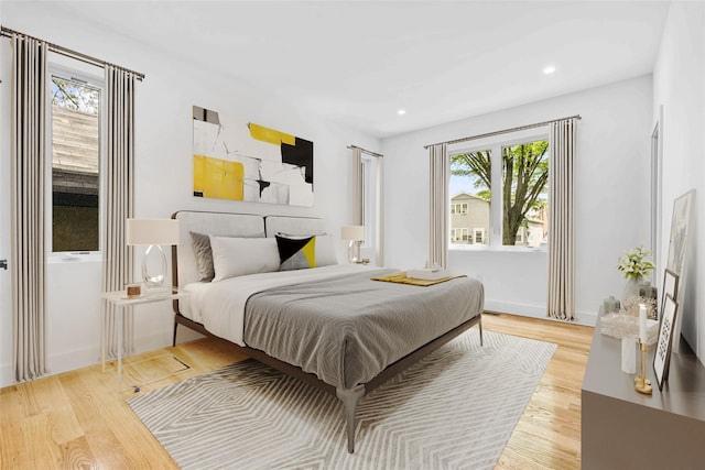 76-17 162nd St, Fresh Meadows, NY 11366 - bedroom featuring baseboards, recessed lighting, and wood finished floors