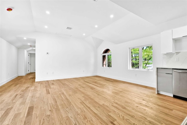 76-17 162nd St, Fresh Meadows, NY 11366 - unfurnished living room featuring visible vents, recessed lighting, light wood finished floors, and vaulted ceiling