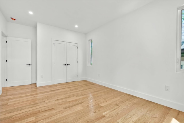 76-17 162nd St, Fresh Meadows, NY 11366 - unfurnished bedroom with recessed lighting, baseboards, and light wood finished floors