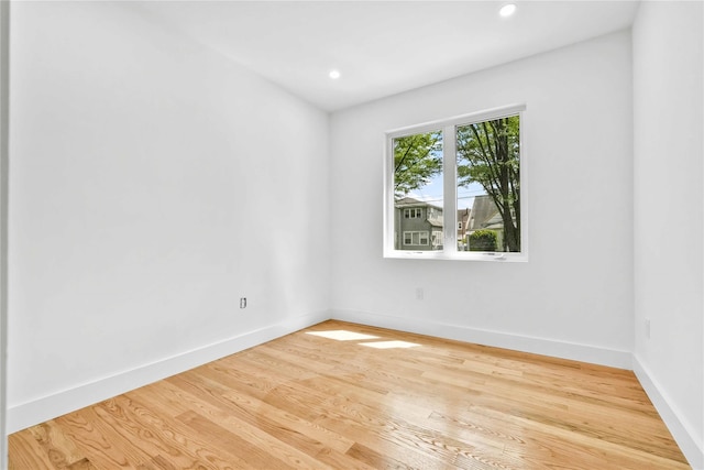 76-17 162nd St, Fresh Meadows, NY 11366 - spare room featuring baseboards, recessed lighting, and wood finished floors