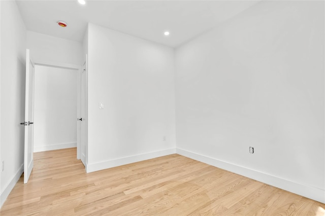 76-17 162nd St, Fresh Meadows, NY 11366 - unfurnished bedroom with light wood-style floors, recessed lighting, and baseboards