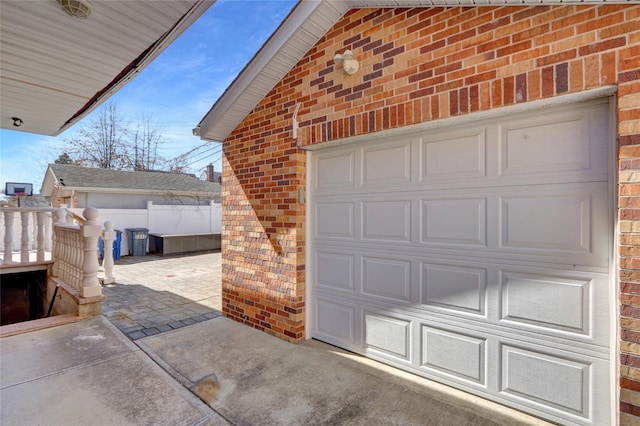 garage featuring fence