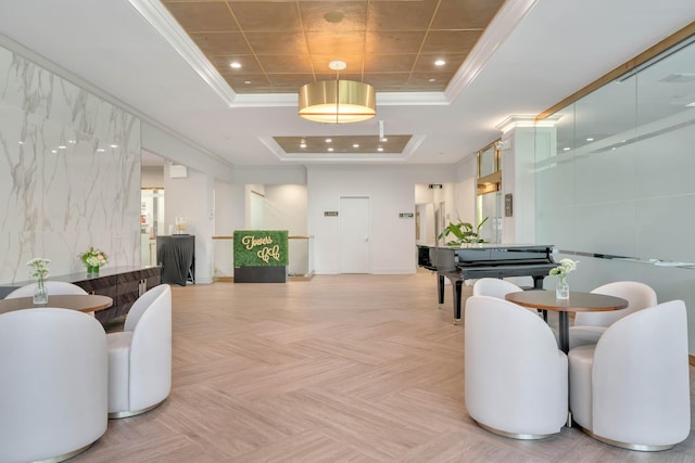 building lobby featuring ornamental molding and recessed lighting
