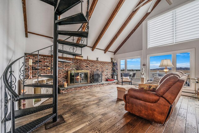 19 Hillside Ave, Northport, NY 11768 - living room with high vaulted ceiling, beamed ceiling, hardwood / wood-style flooring, stairs, and a fireplace