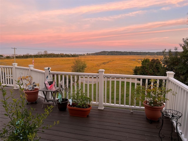 19 Hillside Ave, Northport, NY 11768 - deck at dusk with a view of countryside