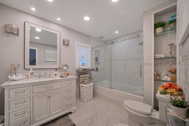 19 Hillside Ave, Northport, NY 11768 - full bathroom with toilet, recessed lighting, bath / shower combo with glass door, vanity, and marble finish flooring