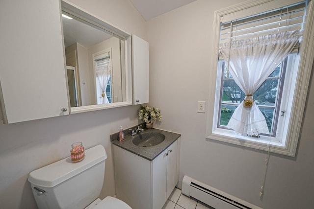 19 Hillside Ave, Northport, NY 11768 - bathroom featuring plenty of natural light, toilet, vanity, and a baseboard radiator