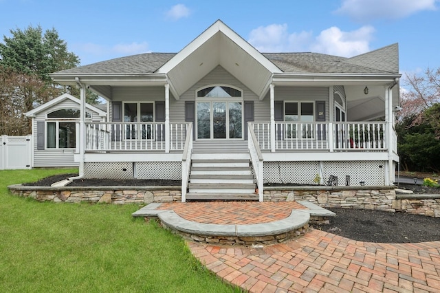 45 Nichols Rd, Huntington Station, NY 11746 - exterior space with a shingled roof, a porch, and a front yard
